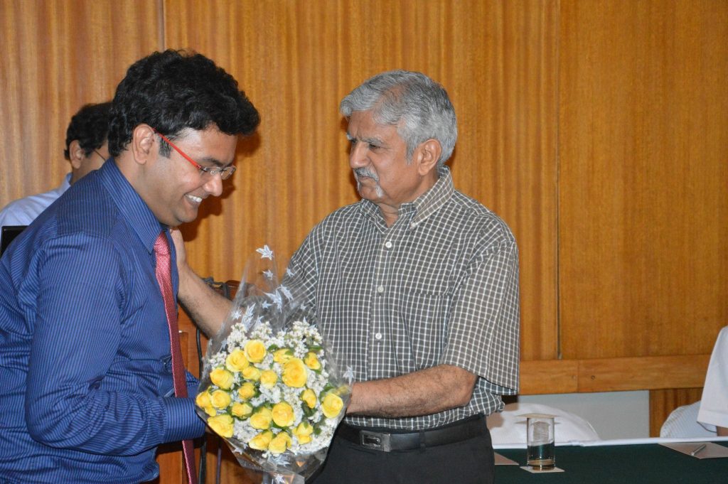 Dr. Manish Sarkar being welcomed at a medical event