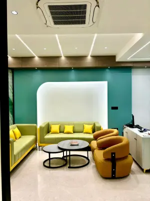 Waiting area with lounge seating at Ehsaas